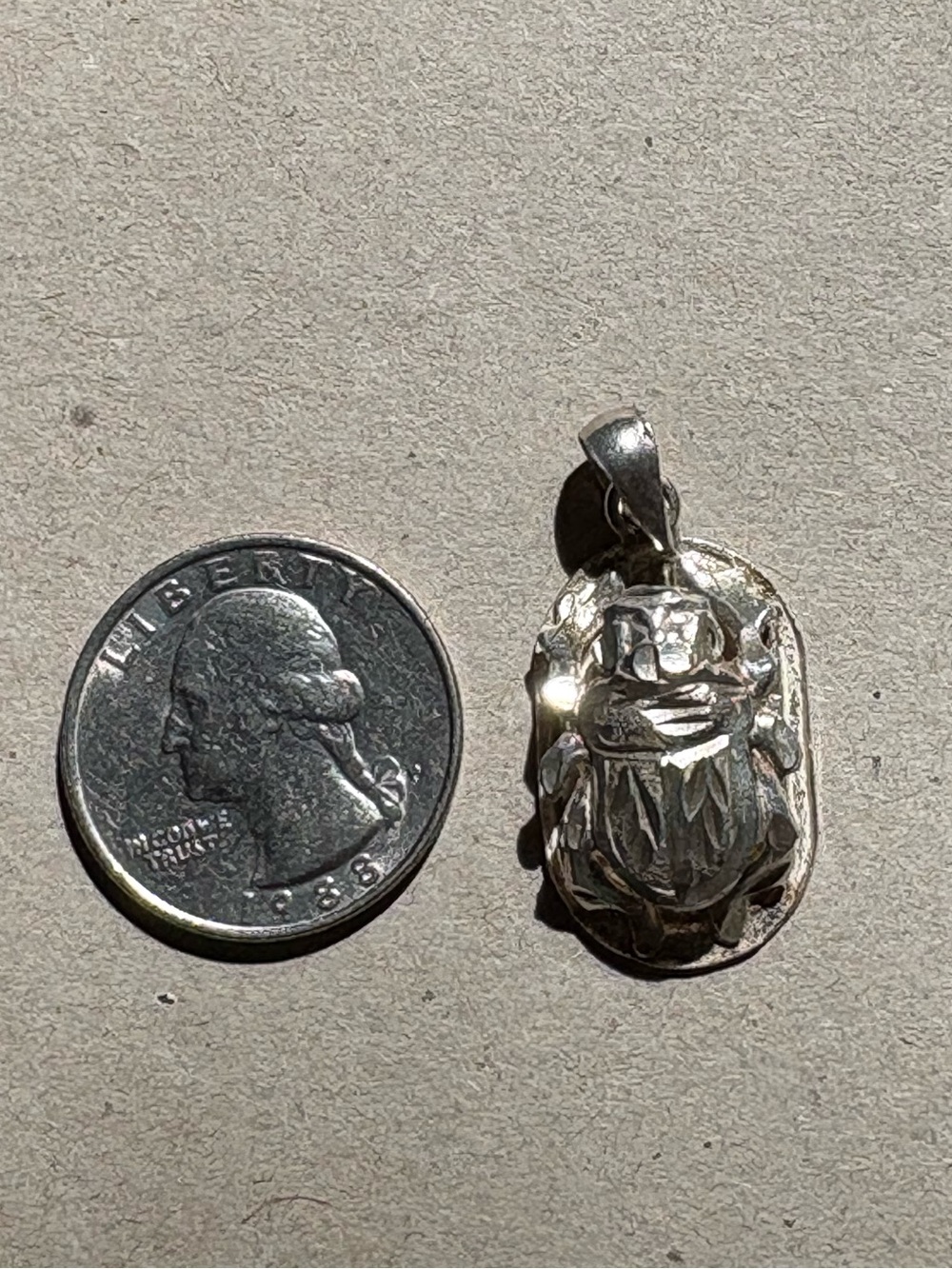Small 1 inch long Sterling Scarab.  Not marked. Purchased in Luxor, Egypt.